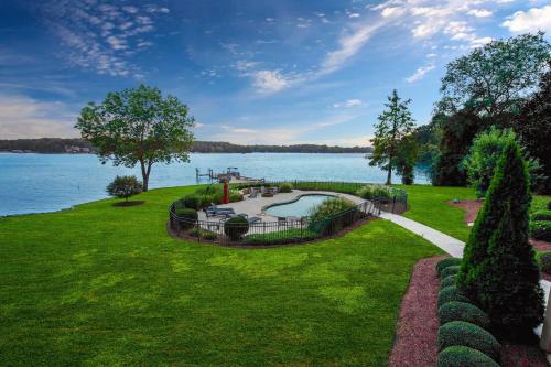 an estate on the shore of a lake at Ringneck Retreat in Mooresville