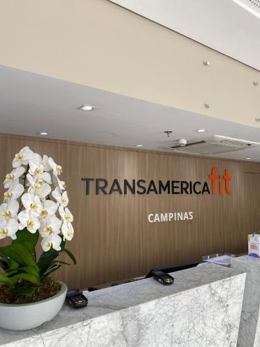 a sign fortransamerican campinas on a wall at Transamerica Fit Campinas in Campinas