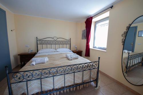 Postel nebo postele na pokoji v ubytování Apartment Nonna Delia