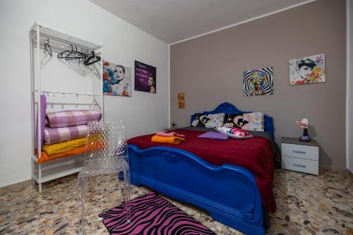 a bedroom with a bed and a bunk bed at Casa vacanza da Giuseppe in Leonforte