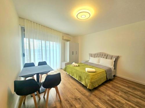 Ένα ή περισσότερα κρεβάτια σε δωμάτιο στο Dea's Apartments