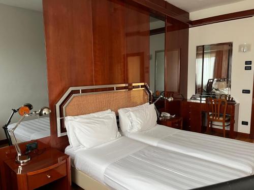 Hotel Napoleonにあるベッド