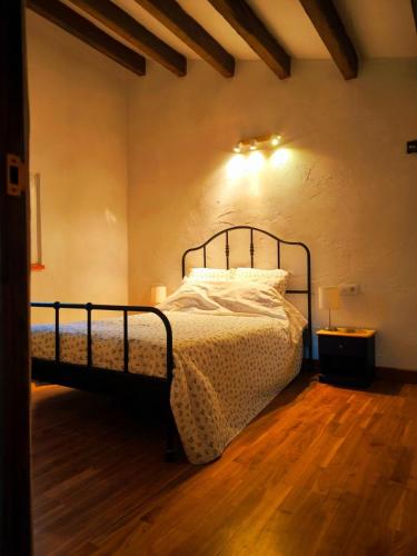 a bedroom with a bed in a room at Beautiful mountain chalet in Siete Aguas
