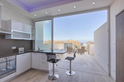Kuchyň nebo kuchyňský kout v ubytování The Penthouse