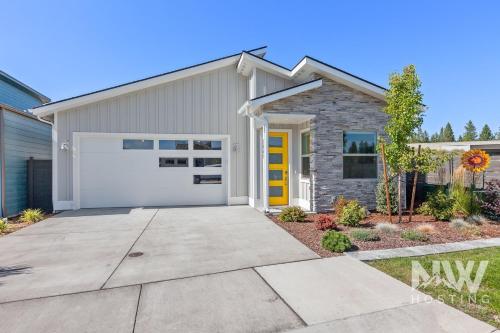 a house with a white garage at RSD 3041 in Coeur d'Alene