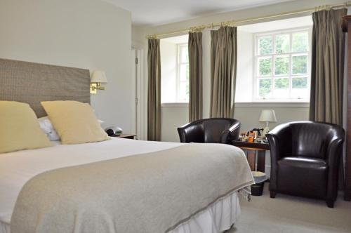 Ένα ή περισσότερα κρεβάτια σε δωμάτιο στο Fortingall Hotel