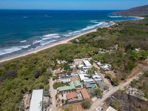 an aerial view of a house on the beach at BP surf hotel in Refundores