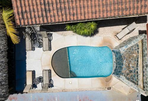an overhead view of a swimming pool at a resort at BP surf hotel in Refundores