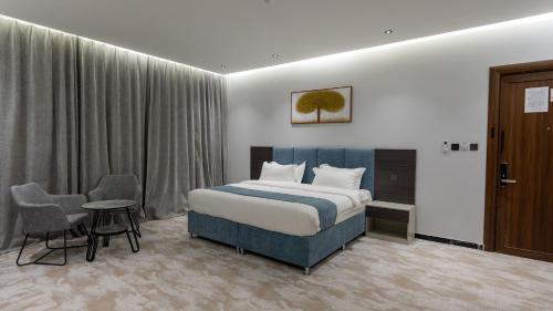 Katil atau katil-katil dalam bilik di فندق قمم بارك Qimam Park Hotel 9