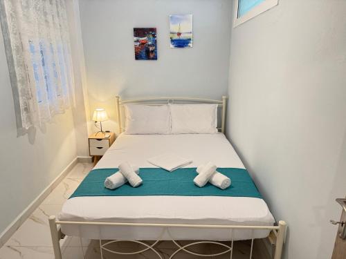 Postel nebo postele na pokoji v ubytování Dimado 4
