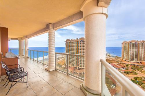 a balcony with a view of the ocean at Oceanfront Tower 3 Gulf & Bay View 3-Bedroom 18th Floor Condo in Pensacola Beach in Pensacola Beach