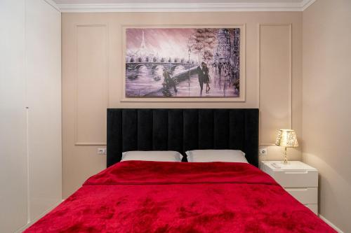 EmeraldApartament tesisinde bir odada yatak veya yataklar
