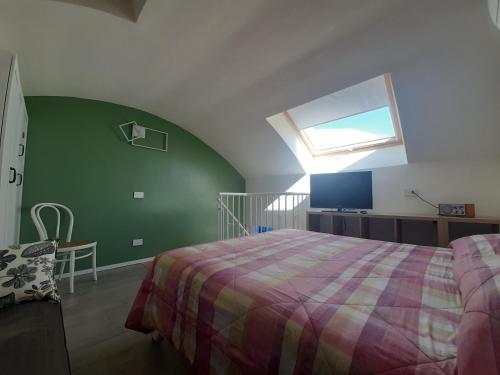 En eller flere senge i et værelse på Fronte Mare 23 Civitanova Marche