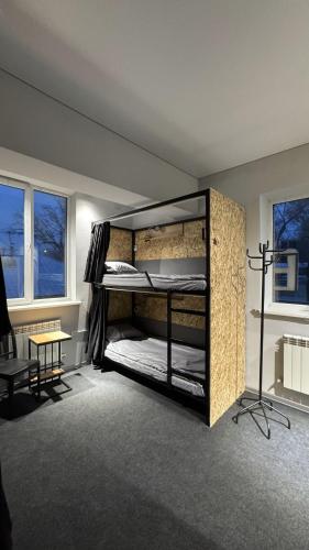 Postel nebo postele na pokoji v ubytování Лучший Хостел Алматы - Саяхат