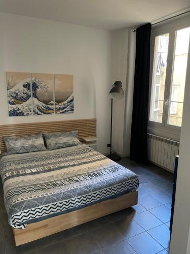 Ένα ή περισσότερα κρεβάτια σε δωμάτιο στο La Finestra sul Porto