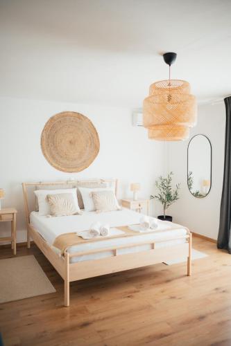 a bedroom with a large white bed in a room at Guesthouse Tamara in Lovište