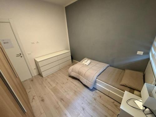 a small bedroom with a bed and a desk at Homes in Ancona CCA23 Rooms in Ancona