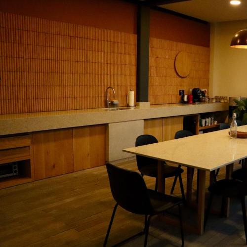 a dining room with a table and chairs at Hotel Boutique Sina in Guadalajara