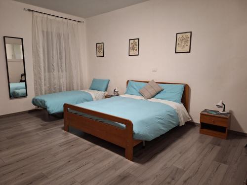 Postel nebo postele na pokoji v ubytování Borgo Carinthia