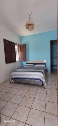 Giường trong phòng chung tại Casa bougainville