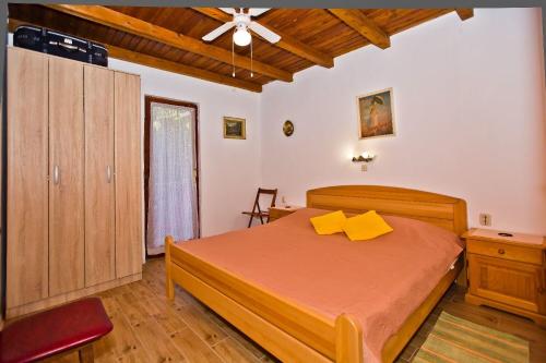 Ένα ή περισσότερα κρεβάτια σε δωμάτιο στο Apartment Kati