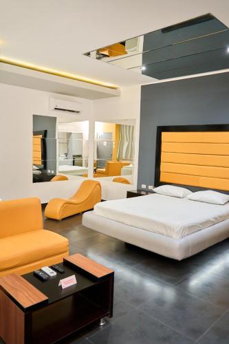Ένα ή περισσότερα κρεβάτια σε δωμάτιο στο Sechura Suites