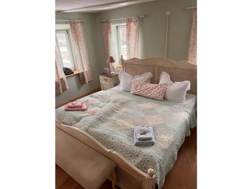 Giường trong phòng chung tại Holiday home Schwarzer Kater