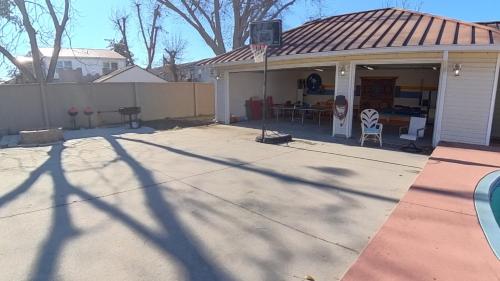 a house with a garage with a roof at Elegant Huge Ocean View 4 King, Private Pool, Huge Yard, Enormous Game Garage, BBQ, & Rooftop Deck in Myrtle Beach