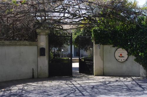 an entrance to a building with a black door at La Piccola Locanda in Modica