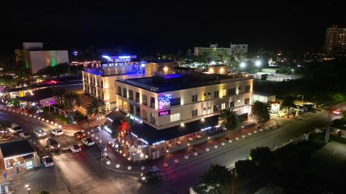 an aerial view of a city at night at The Cove Aruba by Bocobay in Palm-Eagle Beach