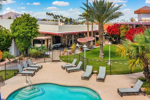 an image of a resort with a swimming pool and a resort at Papago Scottsdale by Reside, Trademark Collection by Wyndham in Scottsdale