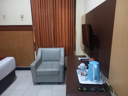 Χώρος καθιστικού στο Urbanview Hotel Dedy Jaya Brebes
