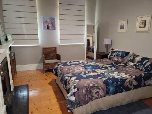 a bedroom with a bed in a room at The Manse in Queenscliff