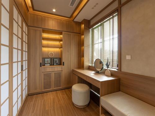 a home office with a desk and a window at Les Sens - Villa Sun Tropical - Bãi Khem in Phu Quoc
