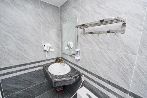 Koupelna v ubytování Swan Motel