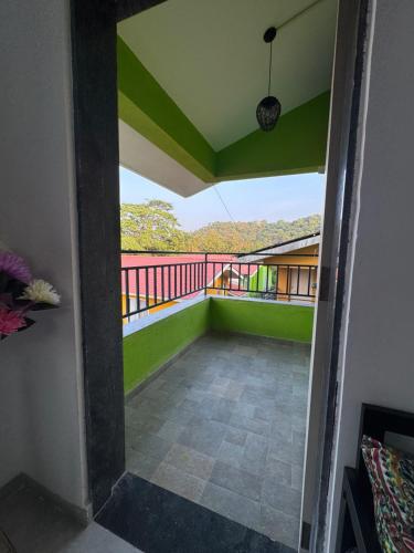 a view from the balcony of a house at Cozy 1BHK Apartment - Casa Asud in Murūd