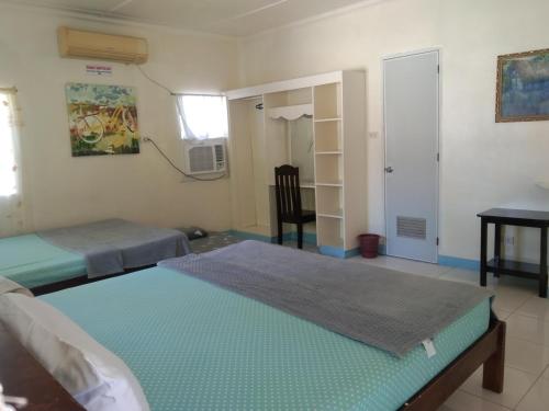 Postel nebo postele na pokoji v ubytování Mayet Beach Resort