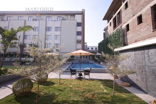 Piscina en o cerca de MARIGOLD-Newly Renovated Hotel