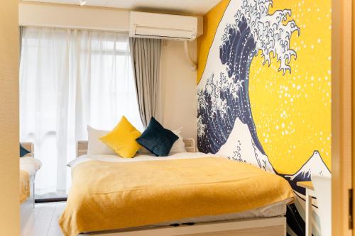 a bedroom with a bed with a painting of a horse on the wall at Japanese Art Room, 2Bed Room, 4Bed, Near Metro&JR station in Tokyo