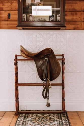 a pair of shoes sitting on a shelf at Kelly House in Beechworth