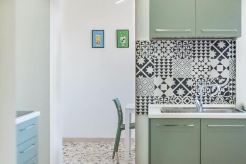 Kuchyň nebo kuchyňský kout v ubytování MM Ciampino Rooms