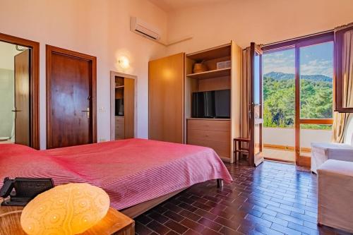 Postel nebo postele na pokoji v ubytování Villa Orizzonte