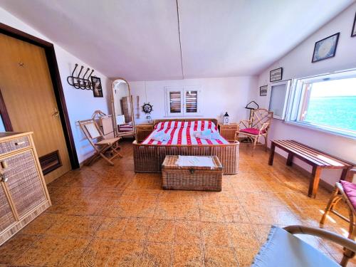 Ένα ή περισσότερα κρεβάτια σε δωμάτιο στο Villa il Timone