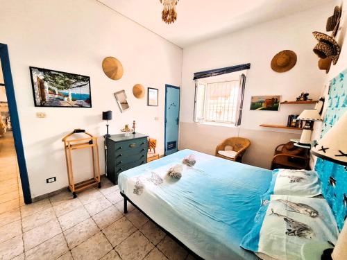 Ένα ή περισσότερα κρεβάτια σε δωμάτιο στο Villa il Timone