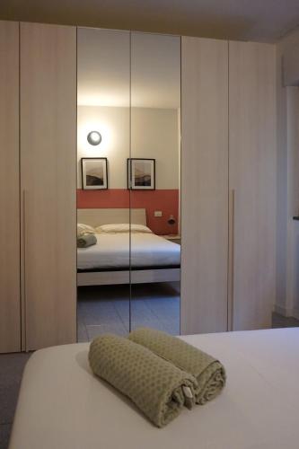 Katil atau katil-katil dalam bilik di Gelsi Apartments Lake Como