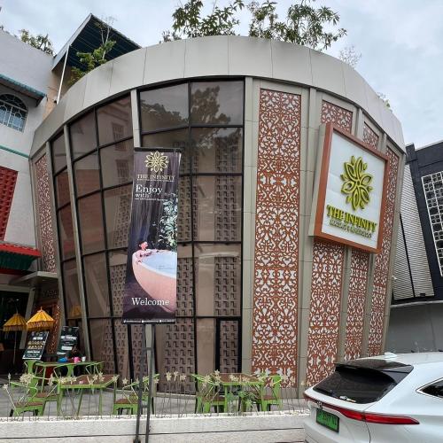 a round building with a sign in front of it at Casabella Homestay 207 Batam Penuin in Nagoya