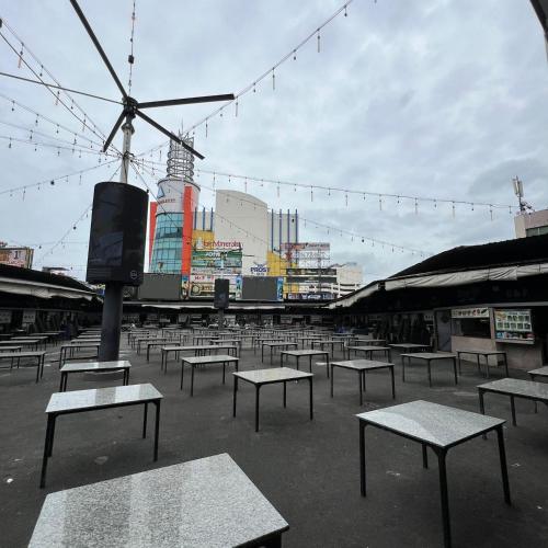a group of benches sitting in a parking lot at Casabella Homestay 207 Batam Penuin in Nagoya