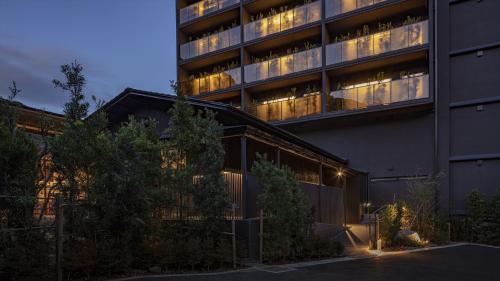 a large building with lights on in front of it at SOKI ATAMI - Vacation STAY 01424v in Atami