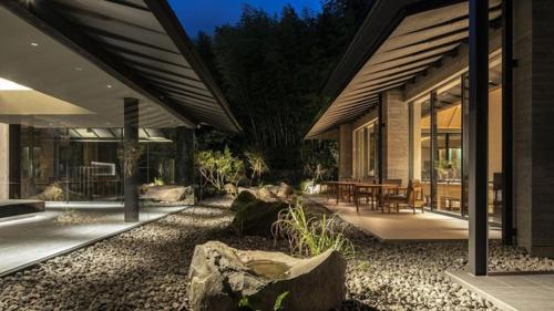 a house with a table and chairs in a yard at SOKI ATAMI - Vacation STAY 01424v in Atami