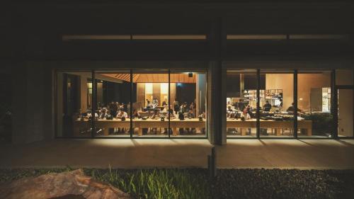 a group of people sitting at tables in a building at SOKI ATAMI - Vacation STAY 01436v in Atami